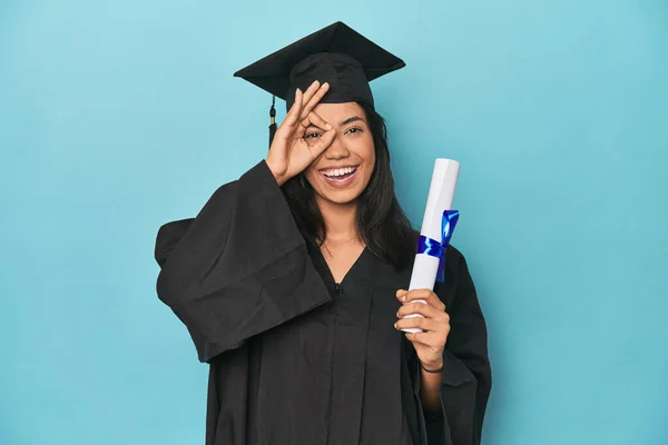 Filipina Graduate Diploma Blue Studio Excited Keeping Gesture Eye — Stock Photo, Image