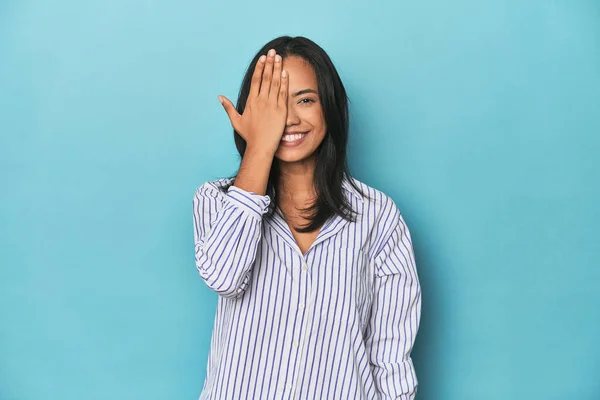 Filipina Young Woman Blue Studio Having Fun Covering Half Face — Stock Photo, Image