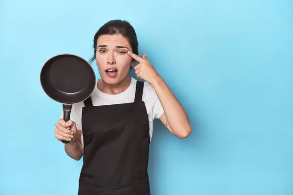 Woman Apron Pan Blue Background Showing Disappointment Gesture Forefinger — Stock Photo, Image