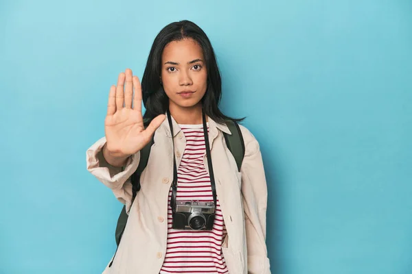 Filipina Woman Camera Backpack Blue Standing Outstretched Hand Showing Stop — Stock Photo, Image