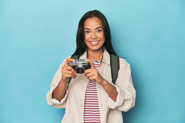 Young Filipina Capturing Moments Camera Blue Studio Backdrop — Stock Photo, Image