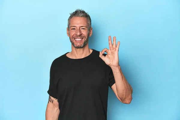 Middle Aged Caucasian Man Blue Backdrop Cheerful Confident Showing Gesture — Stock Photo, Image