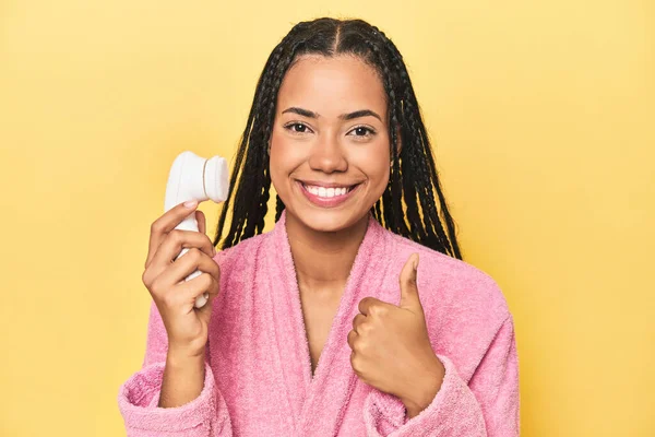 Indonesian Woman Facial Cleaner Yellow Smiling Raising Thumb — Stock Photo, Image