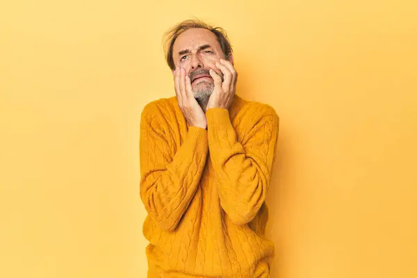 Caucasian Middle Aged Man Yellow Studio Crying Unhappy Something Agony — Stock Photo, Image