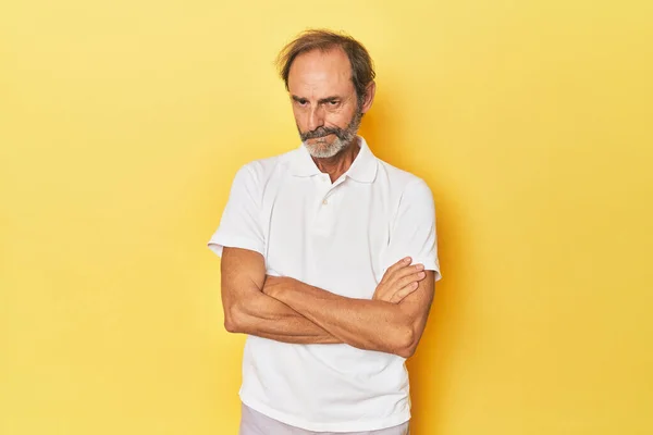 Caucasian Middle Aged Man Yellow Studio Frowning Face Displeasure Keeps — Stock Photo, Image