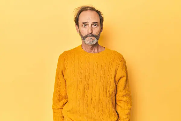 Caucasian Middle Aged Man Yellow Studio Sad Serious Face Feeling — Stock Photo, Image