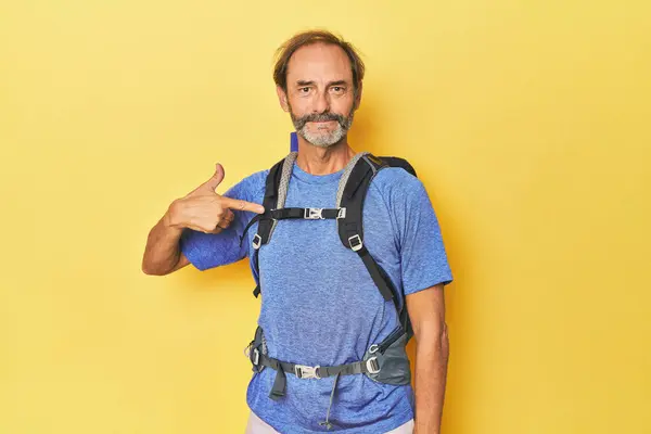Middle Aged Hiker Backpack Studio Person Pointing Hand Shirt Copy — Stock Photo, Image