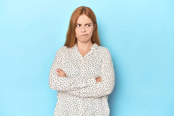 Redhead Young Woman Blue Background Frowning Face Displeasure Keeps Arms — Stock Photo, Image