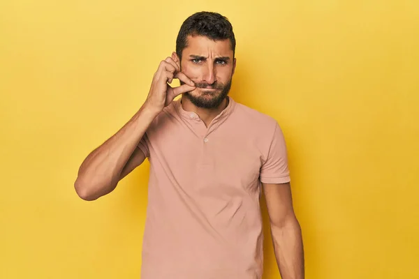 Young Hispanic Man Yellow Background Fingers Lips Keeping Secret — Stock Photo, Image