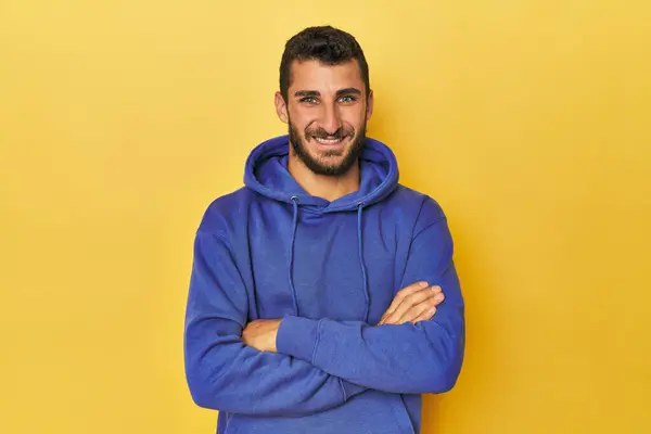 Young Hispanic Man Yellow Background Who Feels Confident Crossing Arms Royalty Free Stock Images
