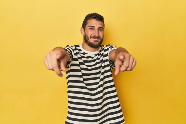 Young Hispanic Man Yellow Background Cheerful Smiles Pointing Front Stock Image