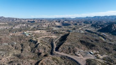 Old open pit uranium mine. Aerial view. clipart