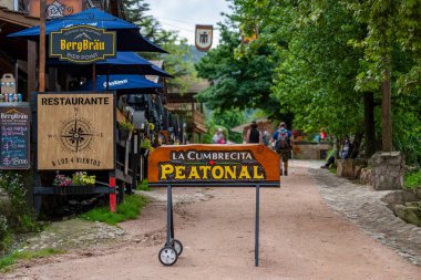 Cordoba, Argentina, October 24, 2024: On a wooden post there is a sign that indicates 