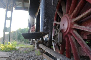 Vintage train locomotive stopped at the station clipart