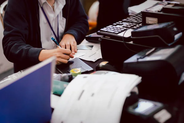 Employee Hand Writing Bank Cheque Counter — Stock Photo, Image