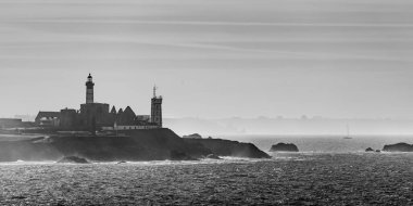 Sea view of Saint Mathieu lighthouse in black and white (Plougonvelin, France) clipart