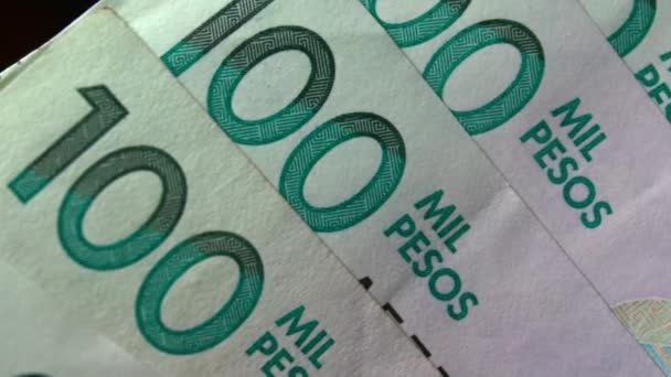 コロンビアのマネーペソ紙 コロンビアの紙幣がCopを閉じる — ストック動画
