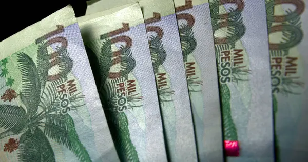 Kolombiya hayranı. Peso Polis faturası.