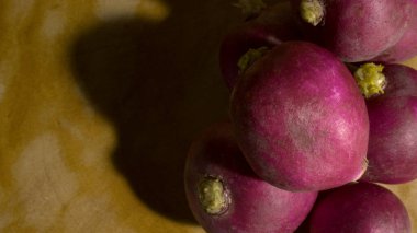 Fresh Red Radish on a Wooden Table Overhead clipart