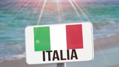 Deniz, sahil ve üzerinde İtalya bayrağı olan beyaz bir tabela