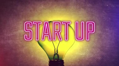 Bir fikrin sembolü olarak bir ampul ve yeni bir şirketin kuruluşu