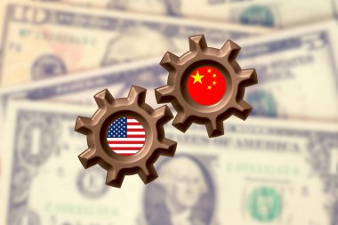 Çin ve ABD arasındaki işbirliğinin sembolü olarak dolar banknotları ve iki çark.