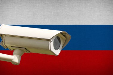 The flag of Russia and a camera as a symbol of a surveillance state clipart