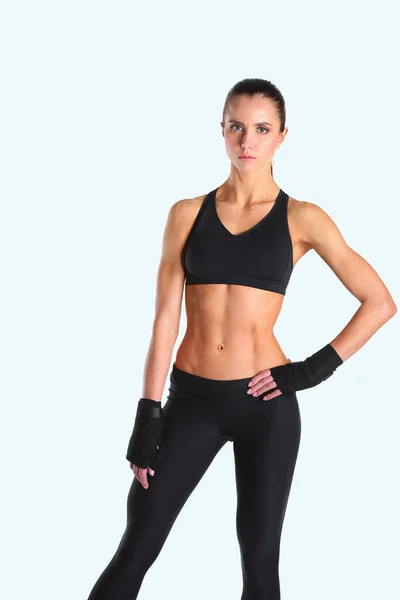 Musclé Jeune Femme Posant Vêtements Sport Sur Fond Noir — Photo