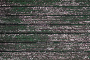 Eski yeşil boyalı ahşap duvarlar yıpranmış çatlak boyayla yengeç desenli, grunge rustik desenli arka plan  