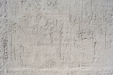Parçalanmış beyaz alçı duvar dokusunun ayrıntıları 