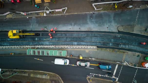 Top Hyperlapse Shot Building Transport Infrastructure Workers Repairing Asphalt Surface — Stock video