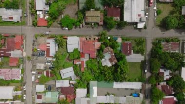 Top view of neighborhood in Puerto Viejo, Costa Rica. Drone flying over the districts of the famous and popular beach town.