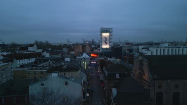 Fly Narrow Street Dusk Large Illuminated Advertisement High Rise Buildings — Video