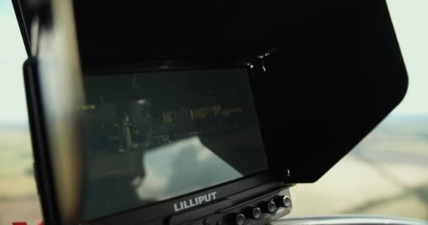 Close View Small Preview Monitor Capturing Inflight Video Zooming Out — Stock Video