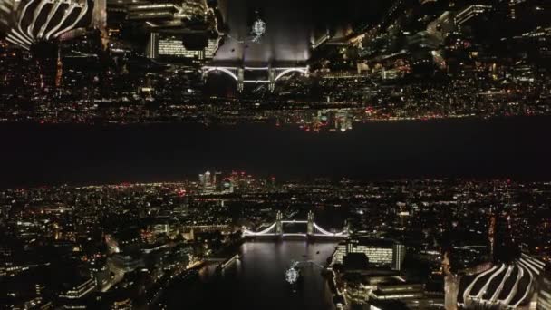 夜のロンドンの空中パノラマビュー テムズ川を渡る有名なタワーブリッジ 抽象的なコンピュータ効果デジタル構成された映像 — ストック動画