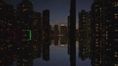 Günbatımında şehirdeki modern yüksek binaların siluetleri. Miami, ABD. Soyut bilgisayar efekti dijital oluşturulmuş görüntüler.
