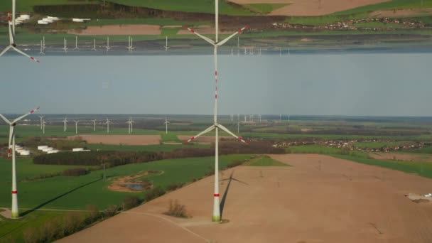 風力発電所の風力発電所の風力発電所を視野に入れています 持続可能なクリーンエネルギーを生産する 抽象的なコンピュータ効果デジタル構成された映像 — ストック動画