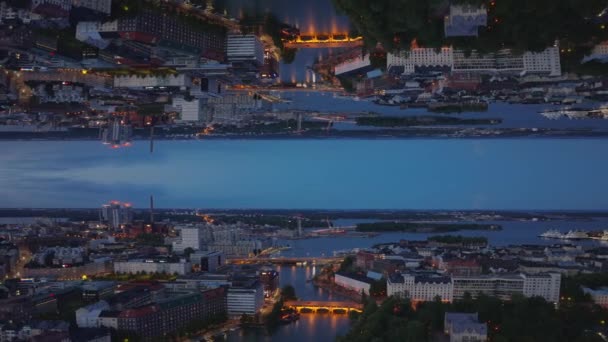 夕暮れの都市とその島々の空中パノラマビュー ヘルシンキ フィンランド 抽象的なコンピュータ効果デジタル構成された映像 — ストック動画