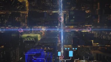 Dijital örtüler gece New York sokaklarını tasvir ederken, akıllı şehir kavramları ve artırılmış gerçeklik sergilenirken teknoloji, kentsel yenilik ve ulaşımı vurguluyor.