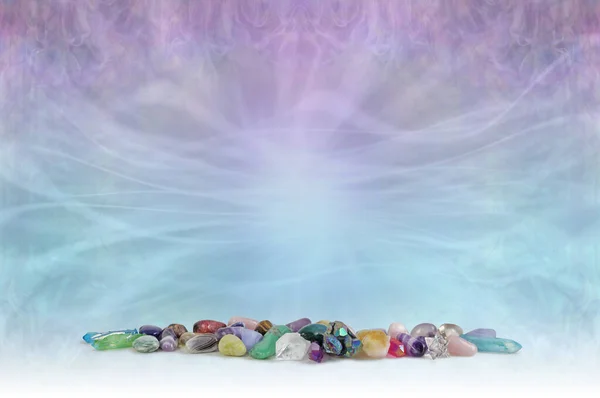 Crystal Healing Diploma Award Certificate A4 Template Background - selection of tumbled stones in a neat row at bottom of pale pink blue ethereal  background with flowing lines and  copy space