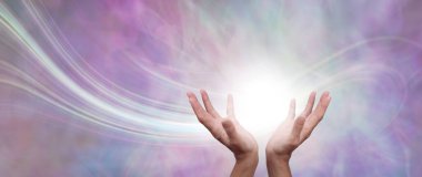 Sending beautiful healing intention across the ether - female open cupped hands with a white orb and trail of light against pastel pink and pale lime background with copy space clipart