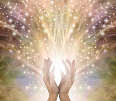 Golden Sparkling Magical Energy Healing Hands Sensing star light - ethereal gold coloured background with an outpouring of stars from cupped female hands reaching up and space for spiritual message clipart