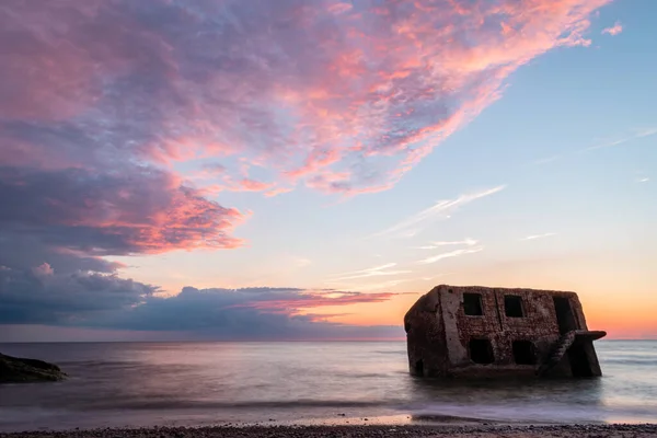 stock image Beautiful and colorful sunset over the Northern forts in the Baltic sea coastline at Karosta (Liepaja, Latvia)