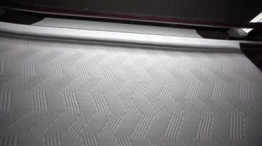 Tekstil fabrikası. Beyaz kumaş dokusu