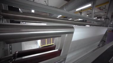 Tekstil fabrikası. Beyaz kumaş dokusu