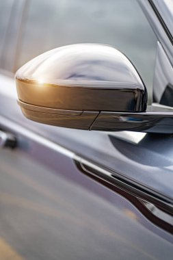 Side car mirror close-up. Details of the business car