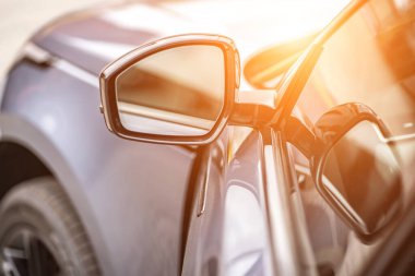 Side car mirror close-up. Details of the business car