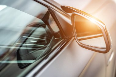 Side car mirror close-up. Details of the business car