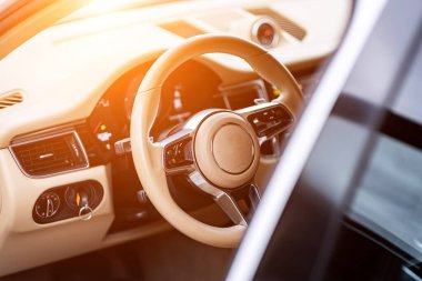 multimedia control panel on the steering wheel of modern car