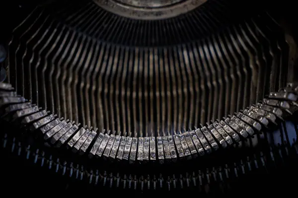 Close up of vintage retro typewriter, dirty typewriter letteters with copy space